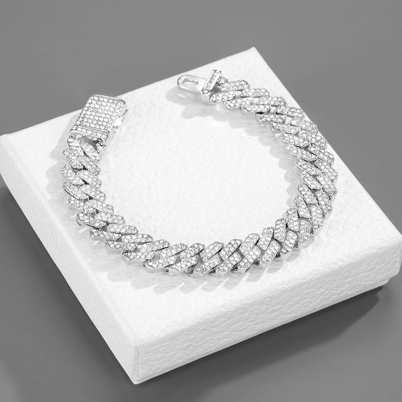 Diamant Kette mit Armreif und Uhr